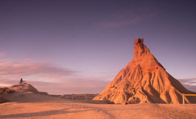 Man in Mountain Bike in Bardenas Reales desert in Navarra, Spain