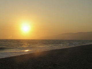 sunset on the beach in malibu