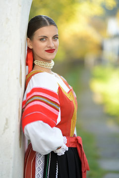 portrait of young woman in slovak folk costume