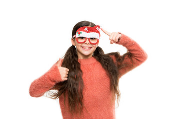 Recommend to try. Girl cute child play with photo booth props. Winter style. Eyeglasses for Santa Claus. Child hold christmas party accessory. Cheerful mood. Christmas holiday. Christmas celebration