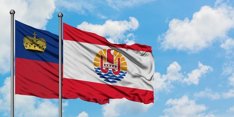 Liechtenstein and French Polynesia flag waving in the wind against white cloudy blue sky together. Diplomacy concept, international relations.