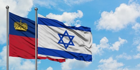 Liechtenstein and Israel flag waving in the wind against white cloudy blue sky together. Diplomacy concept, international relations.