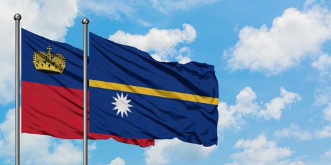Liechtenstein and Nauru flag waving in the wind against white cloudy blue sky together. Diplomacy concept, international relations.