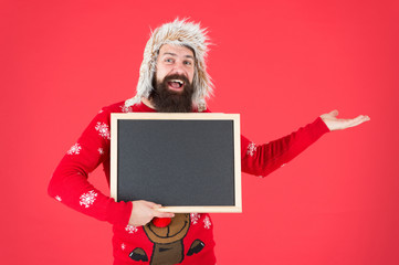 Seasonal offer. Read this. Winter holiday. Schedule timing concept. Bearded man blank blackboard copy space. Chalkboard for information. Presentation concept. Winter announcement. Winter event