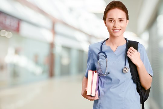 Nurse Student With Books And Stethoscope