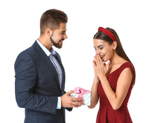 Young man greeting his girlfriend on white background