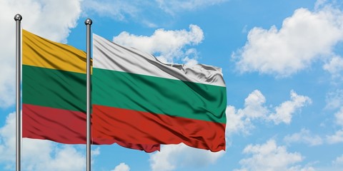 Lithuania and Bulgaria flag waving in the wind against white cloudy blue sky together. Diplomacy concept, international relations.