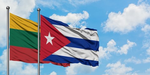 Lithuania and Cuba flag waving in the wind against white cloudy blue sky together. Diplomacy concept, international relations.