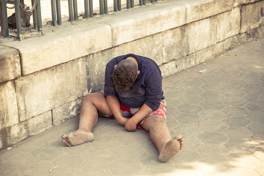 a man sitting on the ground