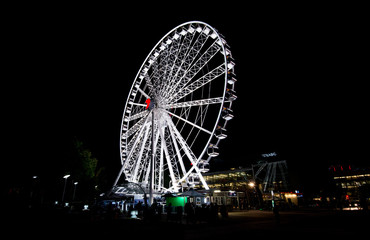 ferris wheel with bright lights at night - Brisbane eye 