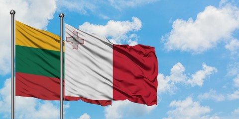Lithuania and Malta flag waving in the wind against white cloudy blue sky together. Diplomacy concept, international relations.