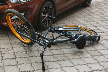 Accident between car and bicycle on city street