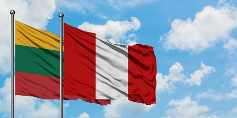 Lithuania and Peru flag waving in the wind against white cloudy blue sky together. Diplomacy concept, international relations.