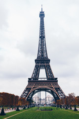 Fototapeta na wymiar Beautiful view of Eiffel tower in Paris, France. Famous touristic places in Europe. European city travel concept.