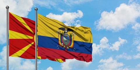 Macedonia and Ecuador flag waving in the wind against white cloudy blue sky together. Diplomacy concept, international relations.