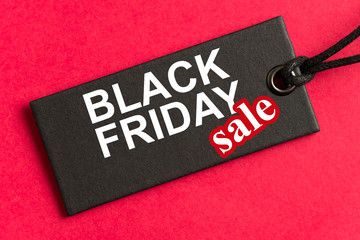 Black Friday sale tag in red background