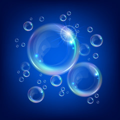Realistic transparent floating soap bubbles with rainbow reflection. Design element for advertising booklet, flyer or poster