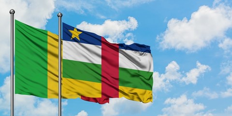 Mali and Central African Republic flag waving in the wind against white cloudy blue sky together. Diplomacy concept, international relations.