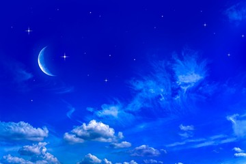 Fototapeta na wymiar New moon . Religion background . The sky at night with stars. Ramadan background . Prayer time . Moon and beautiful night with stars