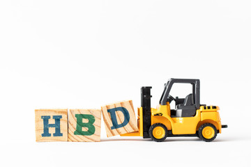 Toy forklift hold wood letter block D to complete word HBD (Abbreviation of happy birthday) on white background