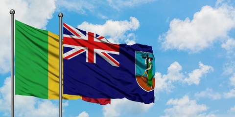 Mali and Montserrat flag waving in the wind against white cloudy blue sky together. Diplomacy concept, international relations.