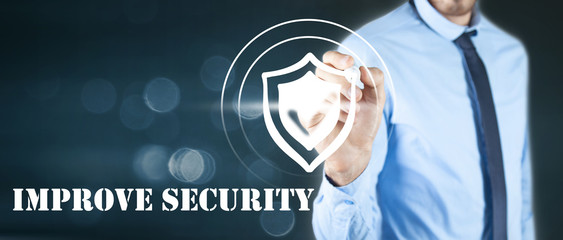 businessman pushes antivirus icon screen