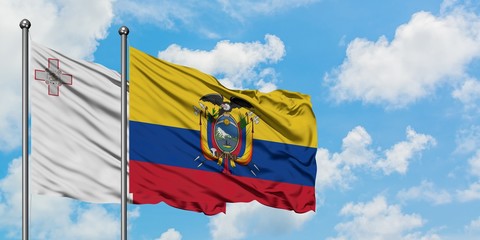 Malta and Ecuador flag waving in the wind against white cloudy blue sky together. Diplomacy concept, international relations.