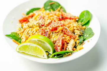 Tender paprika chicken with chilli and coriander wholewheat pasta, vegetables and a tingling sweet chilli dressing