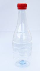 small plastic bottle on white background.