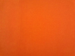 Orange wall texture for background.