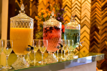 glass juicer with tap, juicers, juice dispenser on the table, bar table setting, crystal dispenser, glass juicer, glass filter, beverage dispenser, juice dispenser, afternoon snack, flavored water