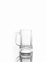 Glass mug on white background. Empty glass cup on white background.