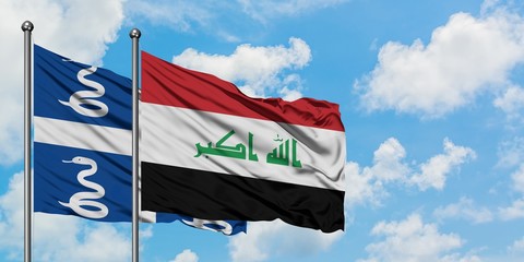 Martinique and Iraq flag waving in the wind against white cloudy blue sky together. Diplomacy concept, international relations.