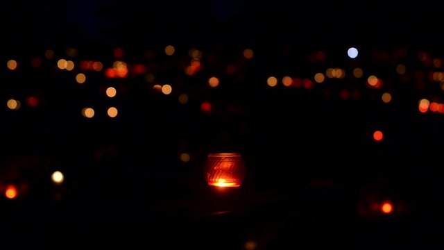candles on graves on the occasion of the "Day of the Dead"