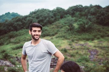 Handsome man standing and looking something at nature,Happy and smiling,Positive thinking,Travel at...