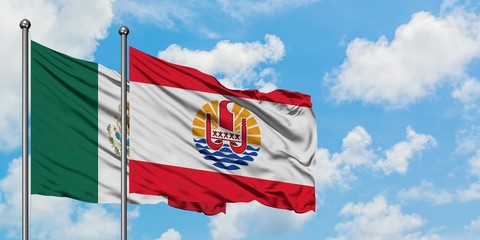 Mexico and French Polynesia flag waving in the wind against white cloudy blue sky together. Diplomacy concept, international relations.