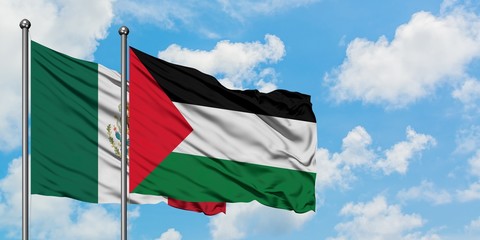 Mexico and Palestine flag waving in the wind against white cloudy blue sky together. Diplomacy concept, international relations.