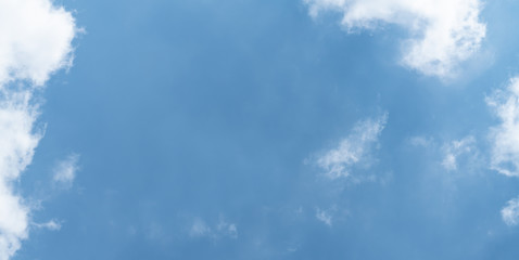white cloud and blue sky background with copy space
