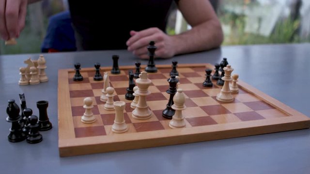 Playing chess at the kitchen table