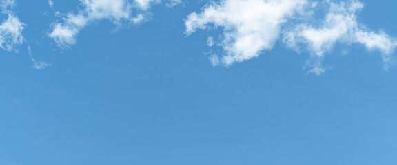 white cloud and blue sky background with copy space