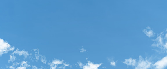 white cloud and blue sky background with copy space