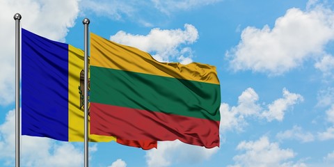 Moldova and Lithuania flag waving in the wind against white cloudy blue sky together. Diplomacy concept, international relations.