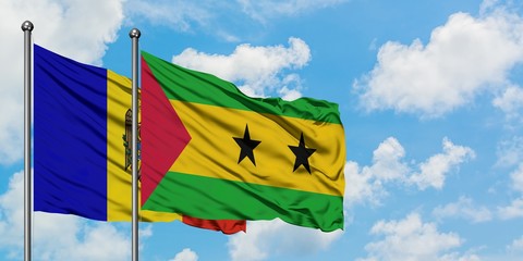 Moldova and Sao Tome And Principe flag waving in the wind against white cloudy blue sky together. Diplomacy concept, international relations.