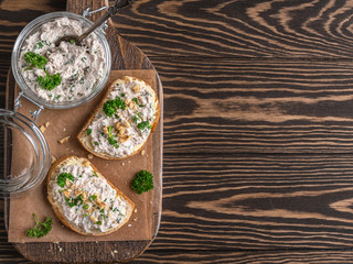 Tasty sandwiches with healthy chicken paste chopped walnuts and parsley