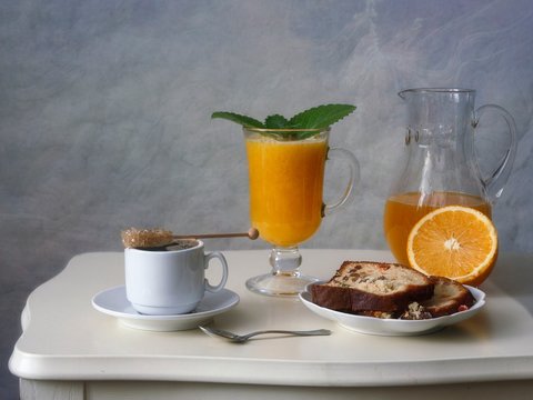 Breakfast with orange juice and croissant