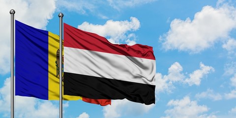 Moldova and Yemen flag waving in the wind against white cloudy blue sky together. Diplomacy concept, international relations.