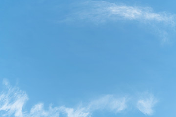 White cloud and blue sky background with copy space