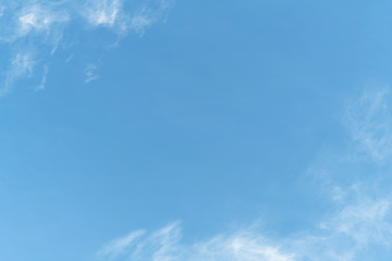 White cloud and blue sky background with copy space