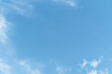 White cloud and blue sky background with copy space