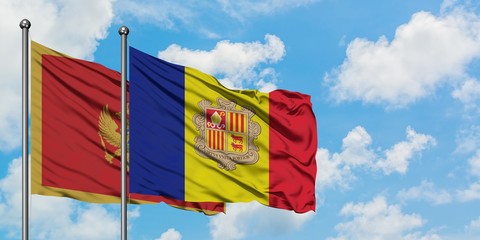 Montenegro and Andorra flag waving in the wind against white cloudy blue sky together. Diplomacy concept, international relations.